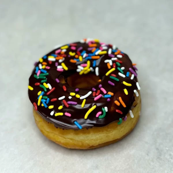 Chocolate glazed donuts with sprinkles