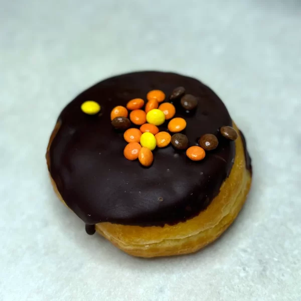 Peanut butter filled donut with M&M